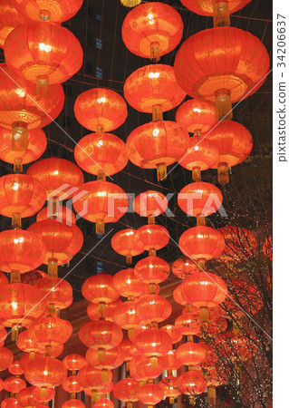 Red lamp hanging on ceiling Red lamp hanging on ceiling 34206637