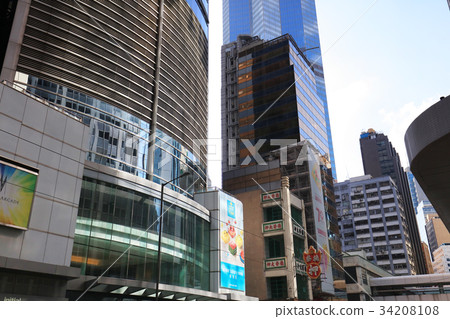 street of highrise glass skyscraper buildings  34208108