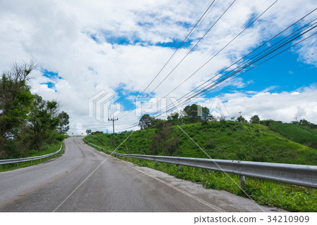 road and clouds on blue sky in summer day road and clouds on blue sky in summer day 34210909