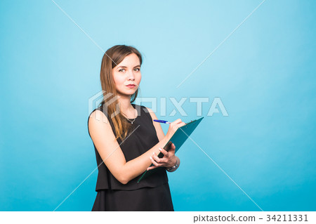 Business woman write on clipboard Business woman write on clipboard 34211331