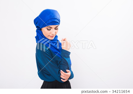 Attractive muslim woman on white background 34211654