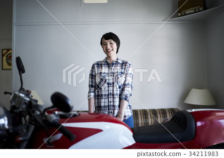 Woman looking at a bike 34211983