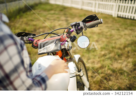 Woman riding a bike Woman riding a bike 34212154