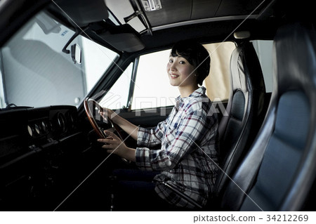 Women driving 34212269