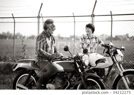 Seniors and women riding bikes Seniors and women riding bikes 34212275