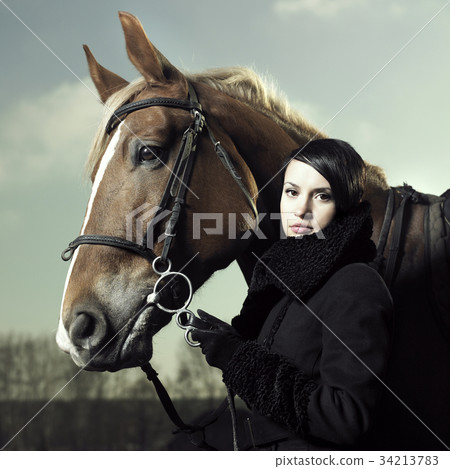 Beautiful girl and horse 34213783