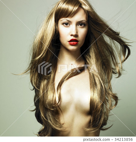 Beautiful woman with magnificent hair 34213856