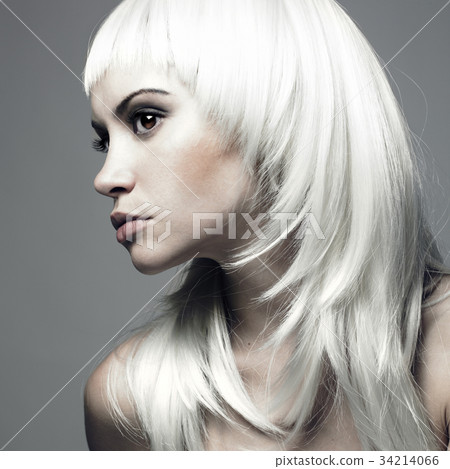 Beautiful young woman with blond hair Beautiful young woman with blond hair 34214066