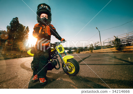 Child on a motorcycle 34214666