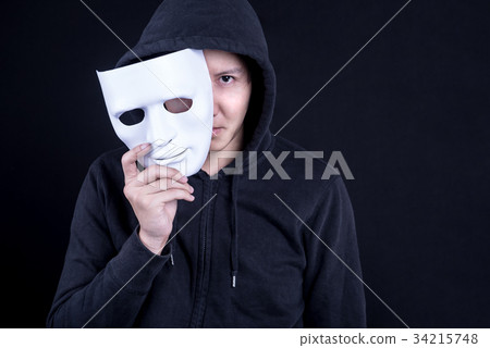 Mystery man holding white mask for hide his face 34215748