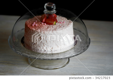 The pastry chef cut the cake. Strawberry yogurt The pastry chef cut the cake. Strawberry yogurt 34217023
