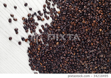 Coffee beans on table Coffee beans on table 34218495