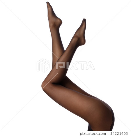 Female legs in black pantyhose Female legs in black pantyhose 34221403