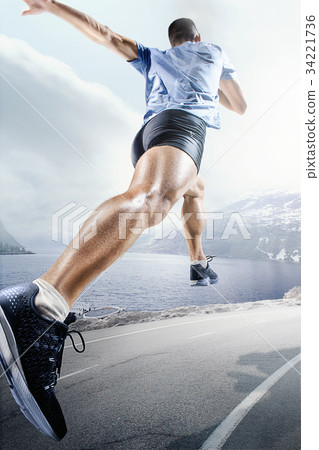 Sport backgrounds. Sprinter starting on the 34221736