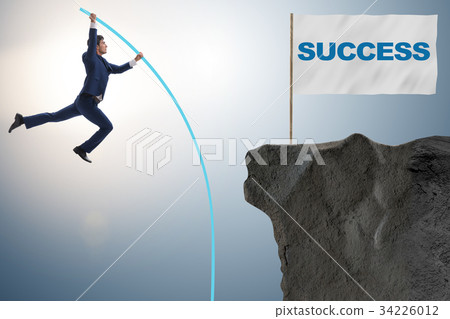 Businessman pole vaulting towards his success goal Businessman pole vaulting towards his success goal 34226012