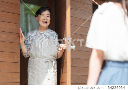 Grandmother grandson three generation homecoming Grandmother grandson three generation homecoming 34226934