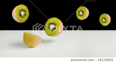 Kiwi Fruit Sliced and Flying Kiwi Fruit Sliced and Flying 34228065