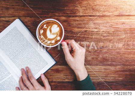 Reading and Relaxing Cozy in Cafe Concept 34228070