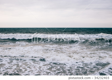 Sea and the waves in winter at dawn Sea and the waves in winter at dawn 34232403