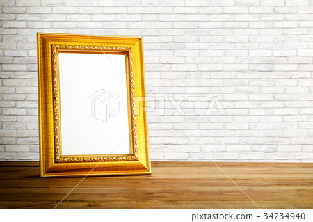 Gold photo frame on wooden Gold photo frame on wooden 34234940