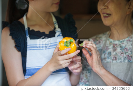 Grandmother grandson cooking Grandmother grandson cooking 34235693