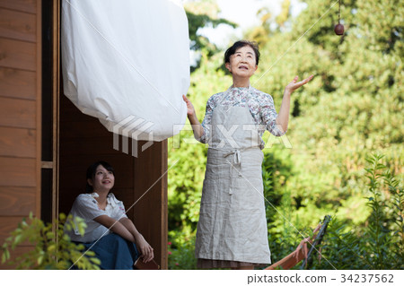 Grandmother grandson laundry housework Grandmother grandson laundry housework 34237562
