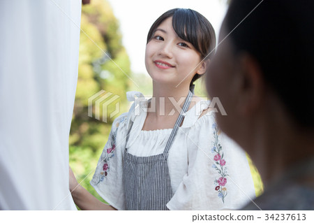 Grandmother grandson laundry housework Grandmother grandson laundry housework 34237613