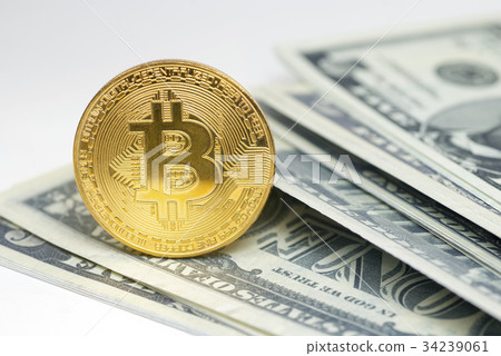 Golden Bitcoin coin on close up Golden Bitcoin coin on close up 34239061