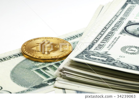 Golden Bitcoin coin on close up Golden Bitcoin coin on close up 34239063