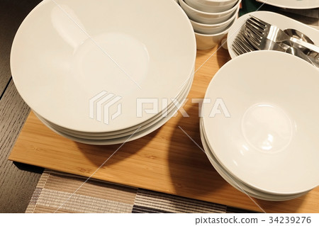 Set of Porcelain Plates, Bowls and Silverware Set of Porcelain Plates, Bowls and Silverware 34239276