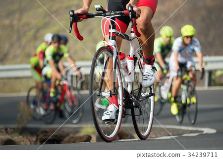 Cycling competition,cyclist athletes riding a race 34239711