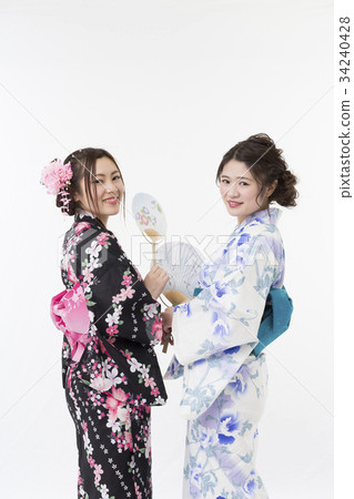 A woman in a yukata A woman in a yukata 34240428