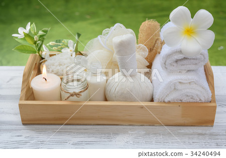 Spa wellness,candle,milk soap,salt,towel,flowers 34240494