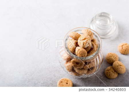 Amaretti cookies in glass pot Amaretti cookies in glass pot 34240803