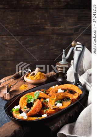 Roasted pumpkin with addition aromatic herbs 34241219