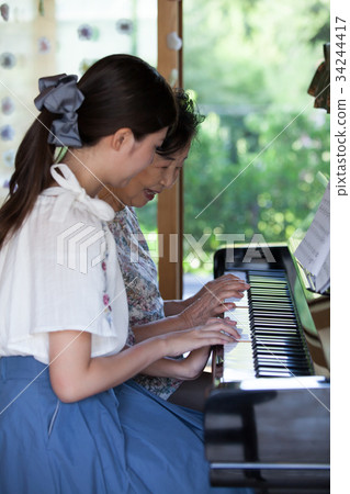 Grandmother grandchild hobby music 34244417