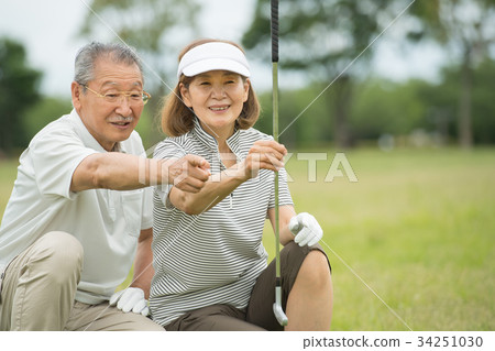 Golf Senior couple active image Golf Senior couple active image 34251030