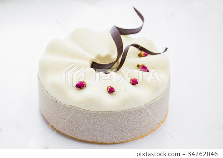 white cake with chocolate icing, food close-up white cake with chocolate icing, food close-up 34262046