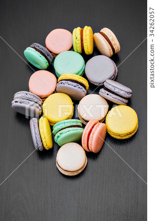 Colorful french macaroons or macarons on black Colorful french macaroons or macarons on black 34262057
