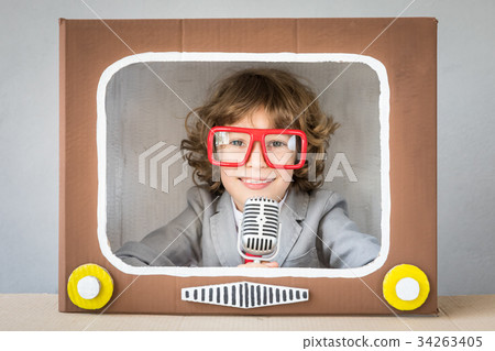 Child playing with cartoon TV 34263405