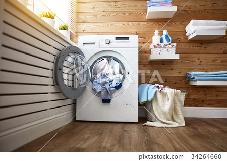 Interior of real laundry room with washing machine 34264660