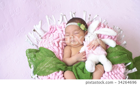 Little newborn baby girl in the Studio 34264696