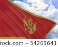 3D rendering of Montenegro flag waving on blue sky 34265641