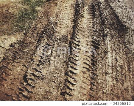 Wheel tracks on the soil 34266813