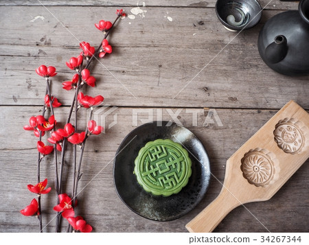 Green tea festival moon cake with tea pot Green tea festival moon cake with tea pot 34267344