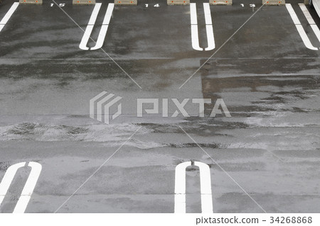 Rainy parking lot 34268868