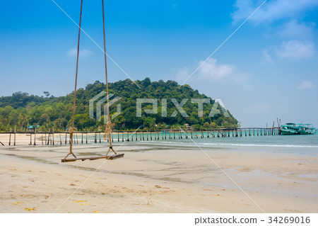 Wood swing in beautiful tropical beach 34269016