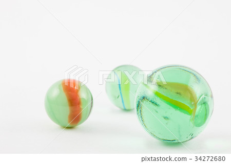 Glass marble balls isolated on white background Glass marble balls isolated on white background 34272680