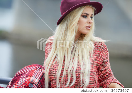 Blonde autumn woman in city Blonde autumn woman in city 34273497