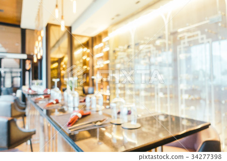 Abstract blur and defocused restaurant interior Abstract blur and defocused restaurant interior 34277398
